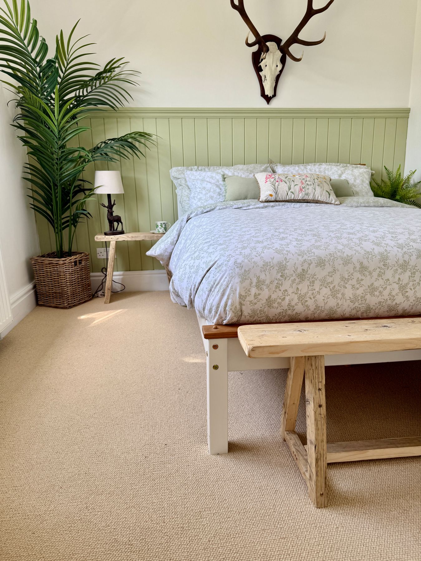 cream cobble loop pile carpet in country bedroom with pink panelling